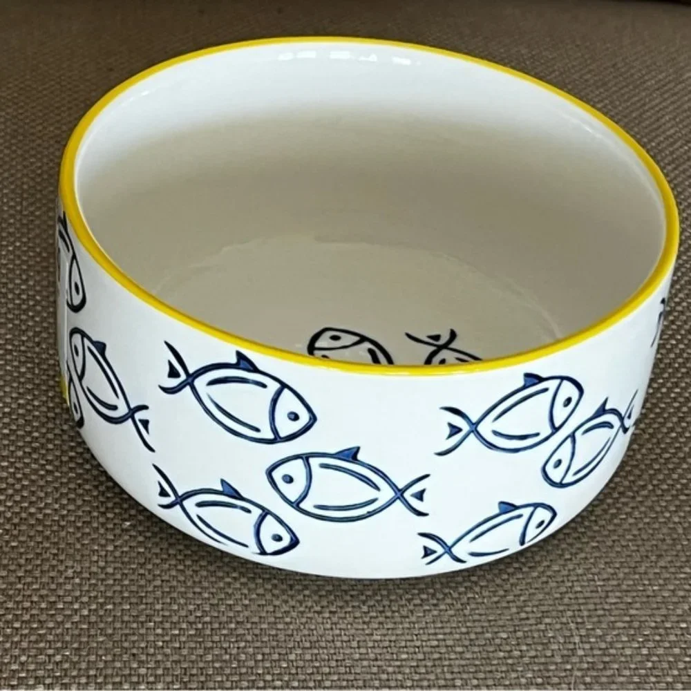 Large Ceramic white bowl with blue fish design. Like new, no scratches or chips.